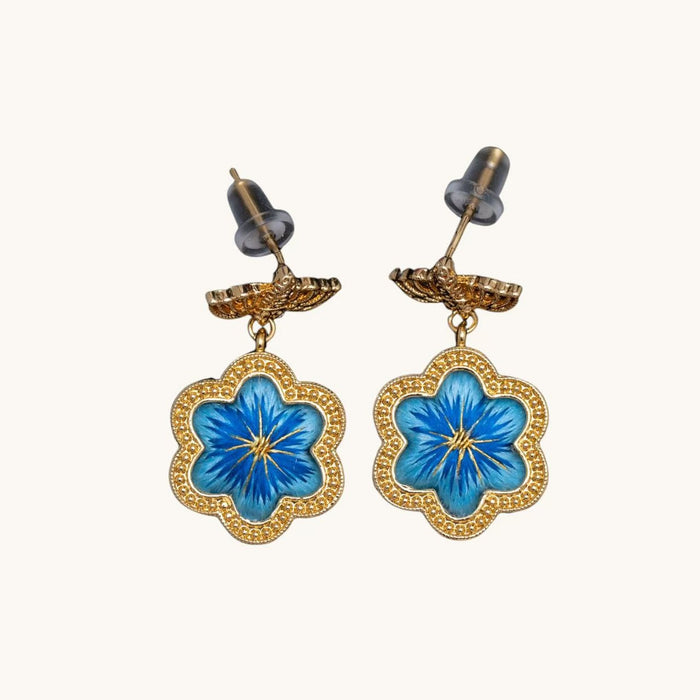 Front view of blue daisy Su-embroidery stud-drop earrings
