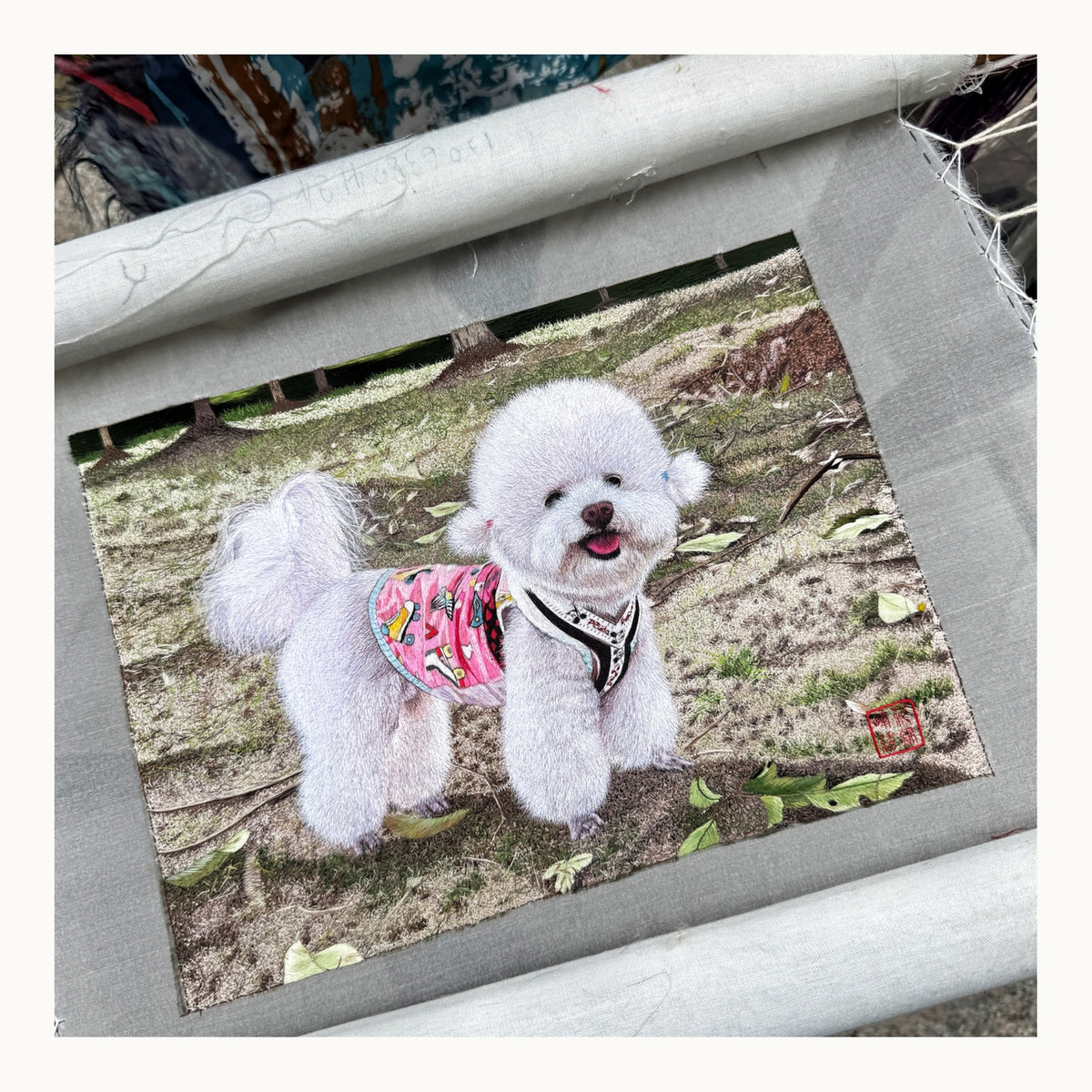 Close-up of silk stitches on custom teddy Su-embroidery portrait