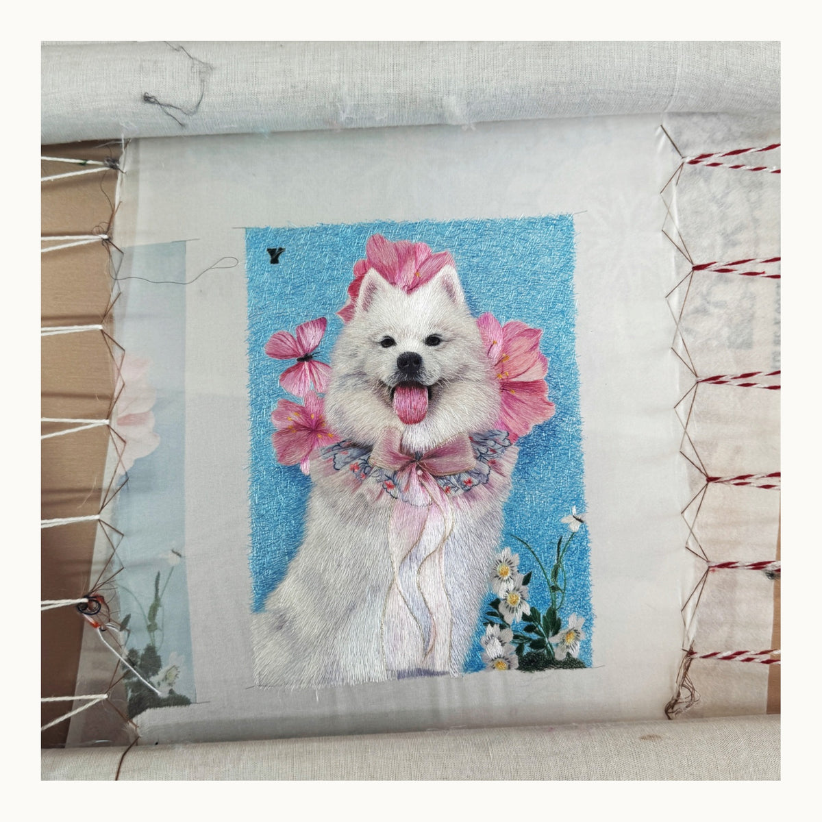 Close-up of silk stitches on custom Samoyed portrait