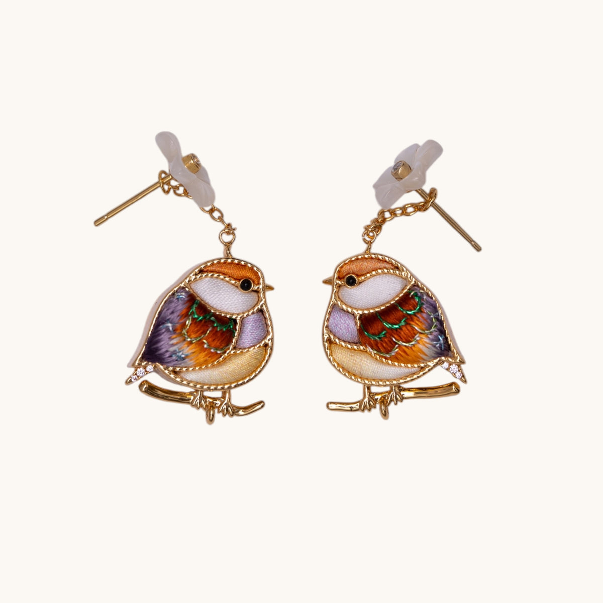 Front view of brown magpie Su-embroidery drop earrings