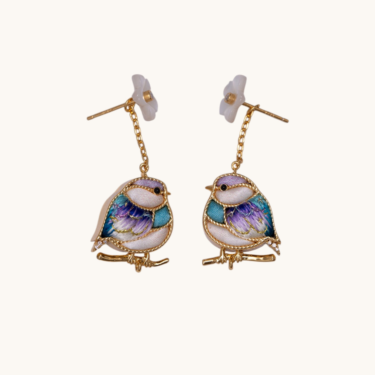 Front view of purple magpie Su-embroidery drop earrings