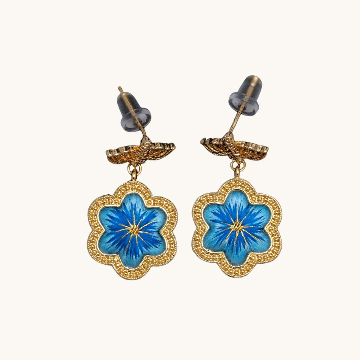 Front view of blue daisy Su-embroidery stud-drop earrings