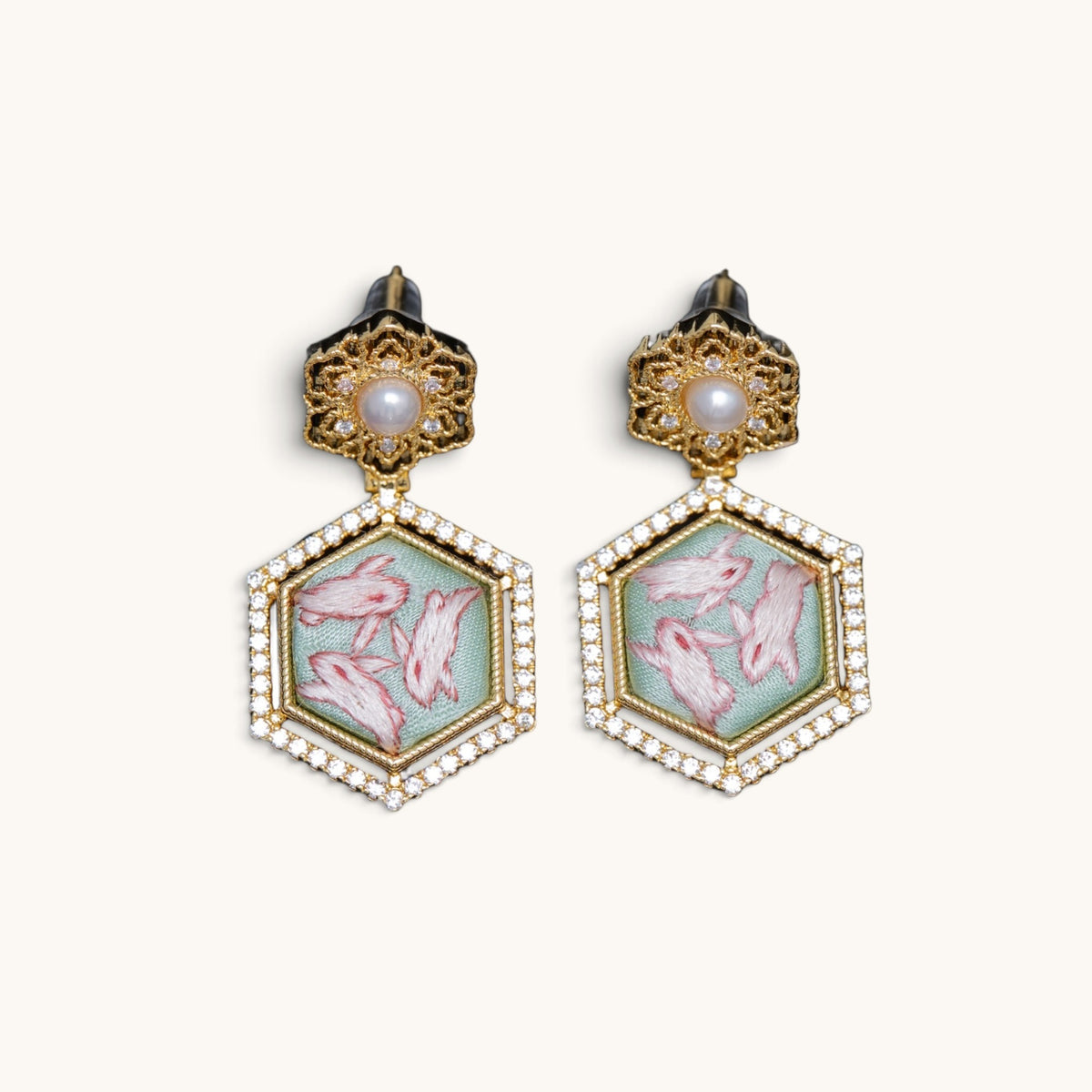 Front view of pink hexagonal hibiscus Su-embroidery dangle earrings