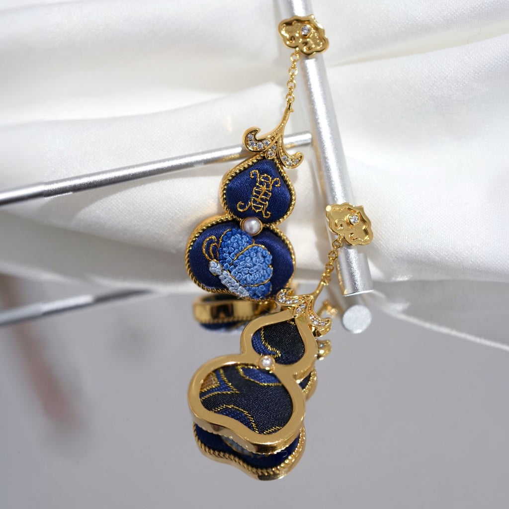 Back view of blue hulu gourd Su-embroidery dangle earrings