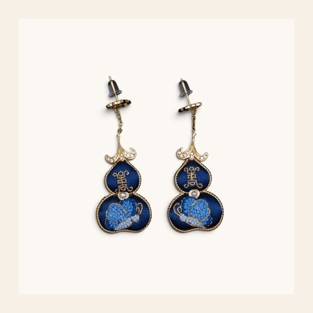 Front view of blue hulu gourd Su-embroidery dangle earrings
