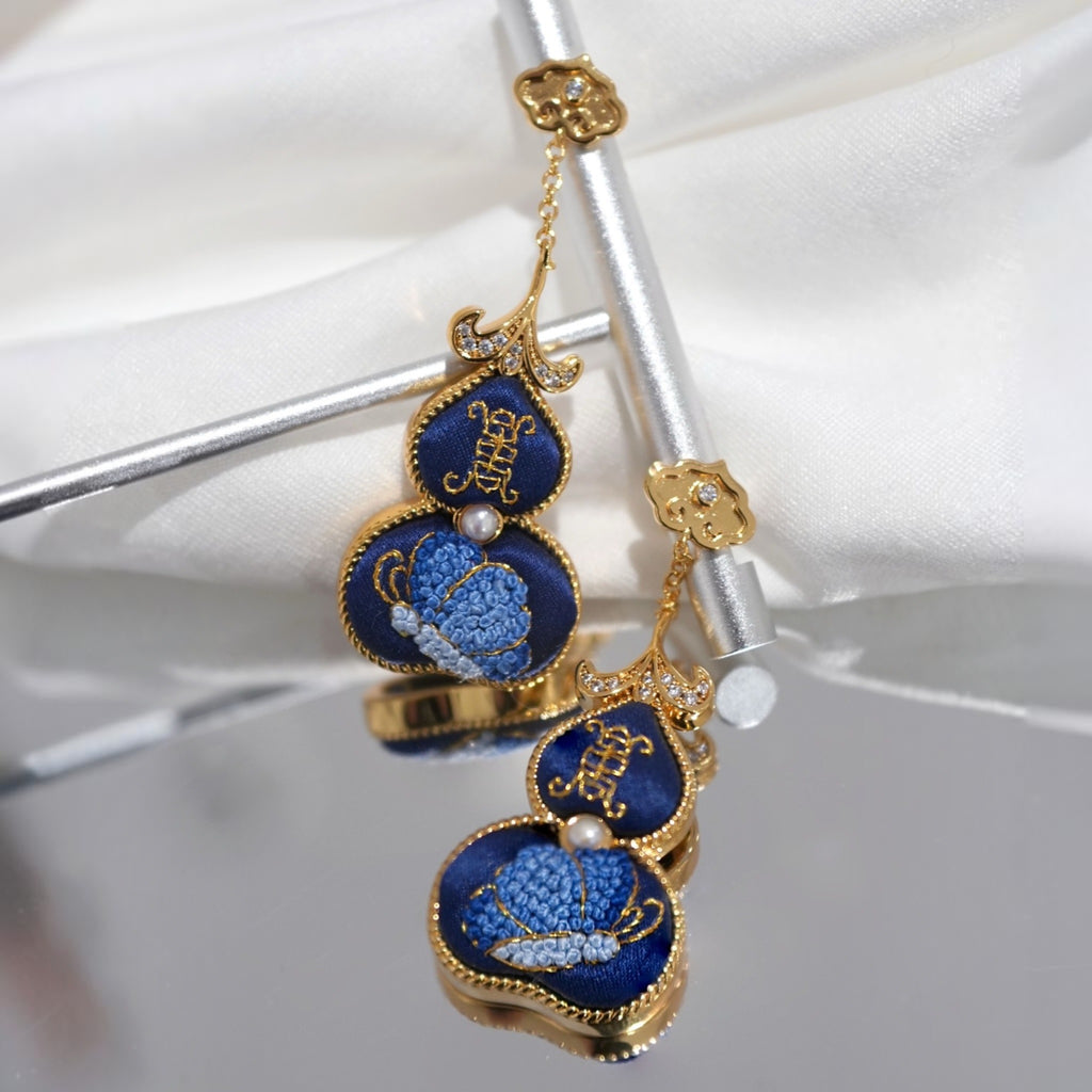 Front view of blue hulu gourd Su-embroidery dangle earrings