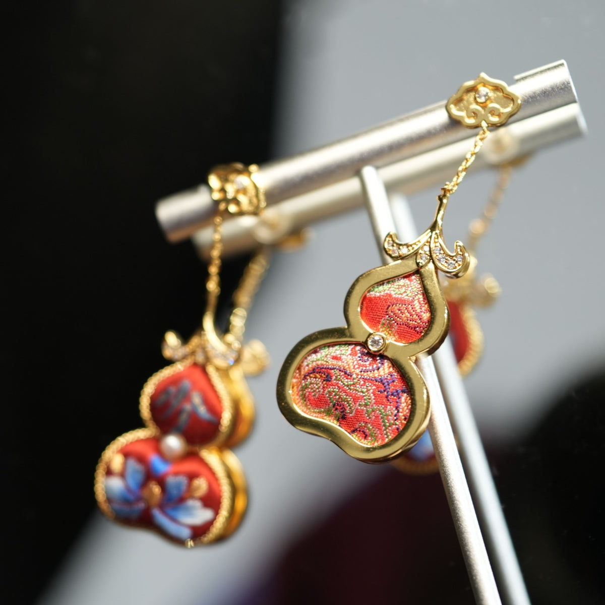 Back view of red hulu gourd Su-embroidery dangle earrings