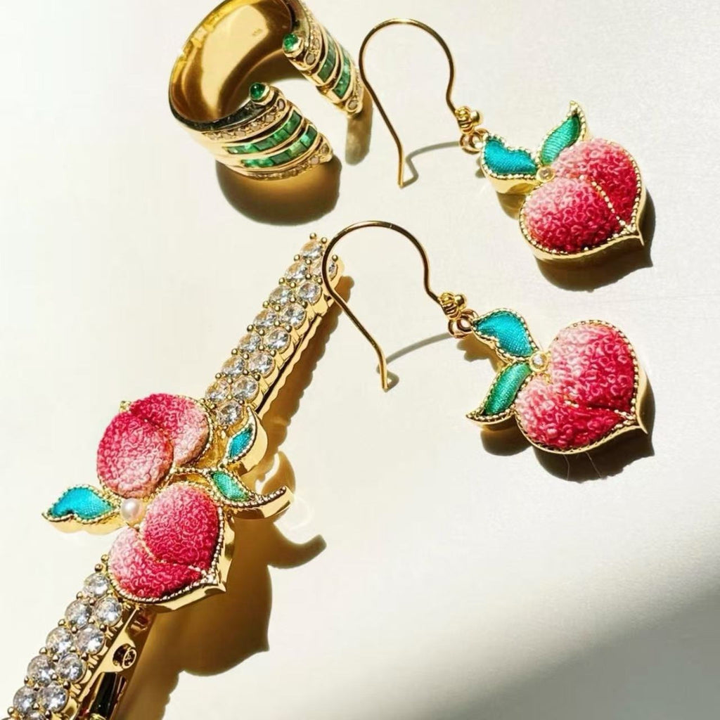 Front view of red peach Su-embroidery hair accessory