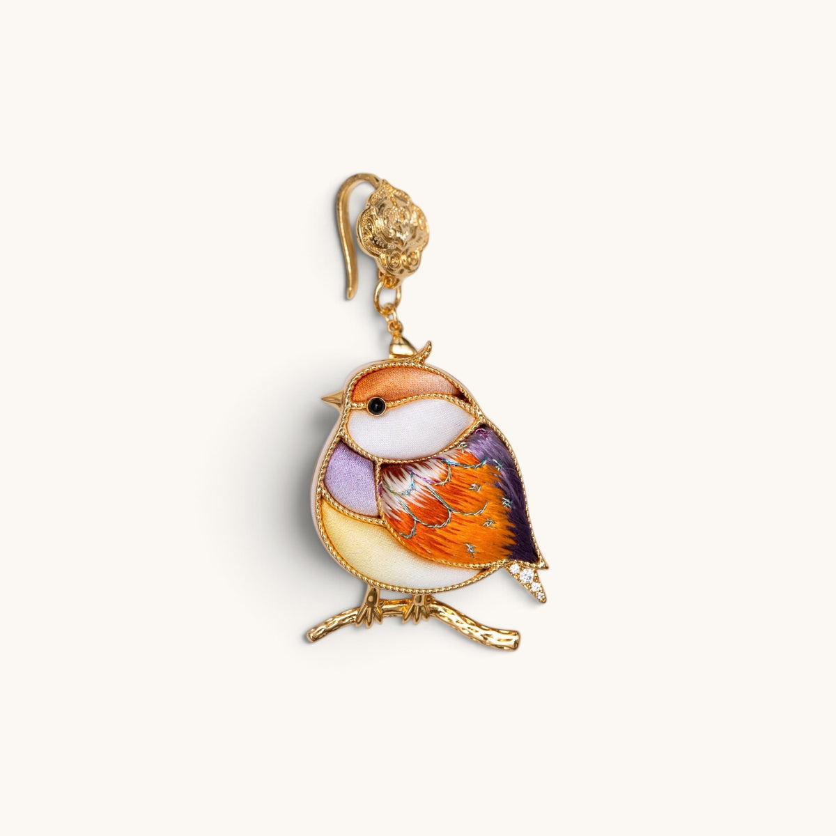Front view of brown magpie Su-embroidery pendant